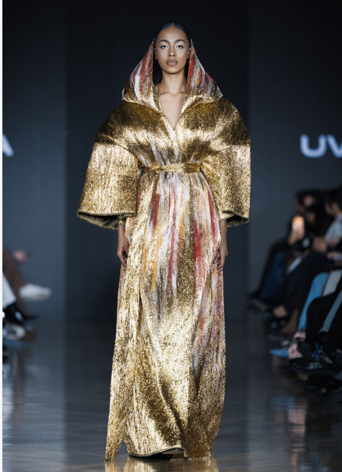 Statement couture gown crafted in shimmering gold