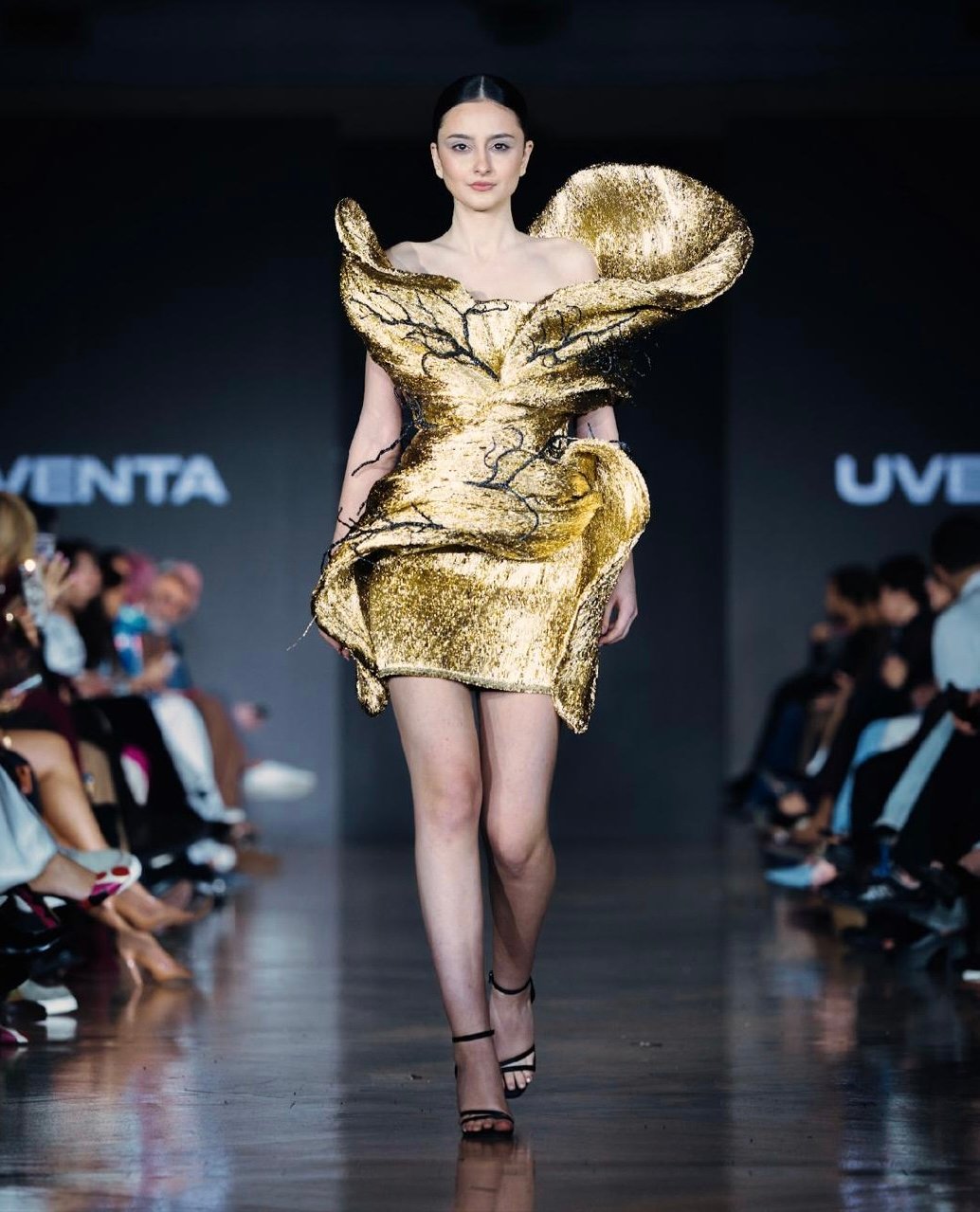 Striking gold couture mini dress